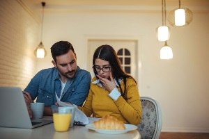 Couple reviewing credit scores