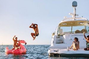 Friends enjoying a day on the lake in their boat