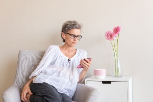 Older woman looking at phone