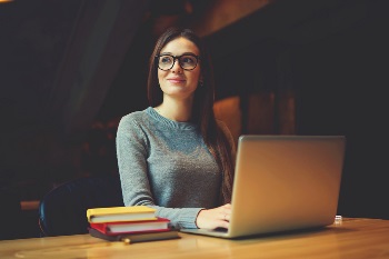 young girl thinking of ways to pay for college