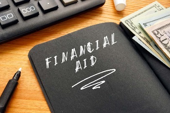 Book with "financial aid" written on the outside of it