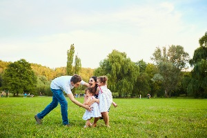 family enjoying free memorial day weekend at the park