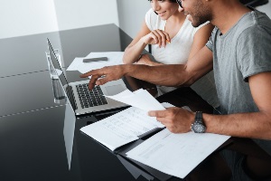 Couple looking at laptop