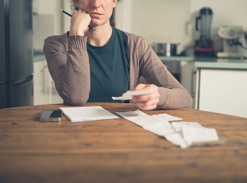 woman worried about expenses