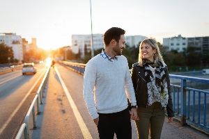 Happy couple on a bridge