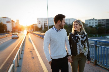 Happy couple on a bridge